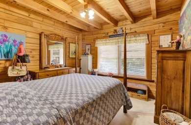 This beautifully maintained log home offers charm, character on Lake Mohawk Golf Club in Ohio - for sale on GolfHomes.com, golf home, golf lot