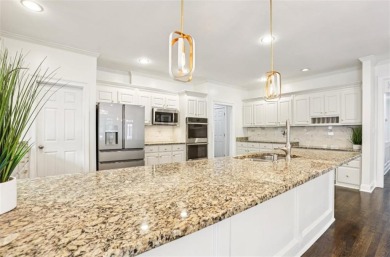 Discover an extraordinary 8,999 square foot sanctuary perfect on Brookstone Golf and Country Club in Georgia - for sale on GolfHomes.com, golf home, golf lot