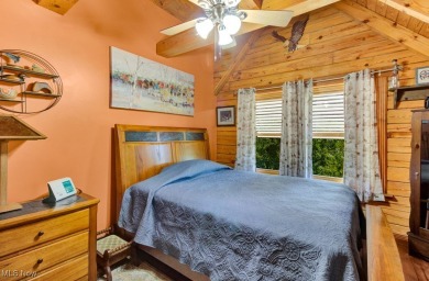 This beautifully maintained log home offers charm, character on Lake Mohawk Golf Club in Ohio - for sale on GolfHomes.com, golf home, golf lot