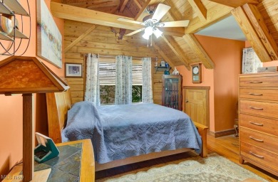 This beautifully maintained log home offers charm, character on Lake Mohawk Golf Club in Ohio - for sale on GolfHomes.com, golf home, golf lot