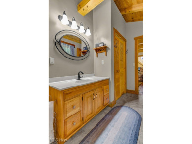 This beautifully maintained log home offers charm, character on Lake Mohawk Golf Club in Ohio - for sale on GolfHomes.com, golf home, golf lot