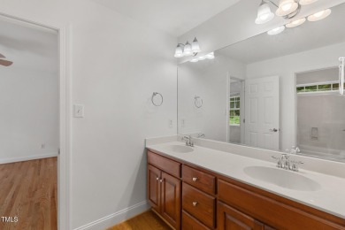 Welcome to this beautiful 2.5 story home on a private, wooded on The Neuse Golf Club in North Carolina - for sale on GolfHomes.com, golf home, golf lot