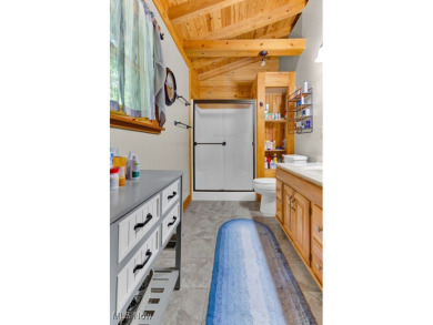 This beautifully maintained log home offers charm, character on Lake Mohawk Golf Club in Ohio - for sale on GolfHomes.com, golf home, golf lot