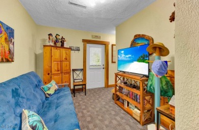 This beautifully maintained log home offers charm, character on Lake Mohawk Golf Club in Ohio - for sale on GolfHomes.com, golf home, golf lot