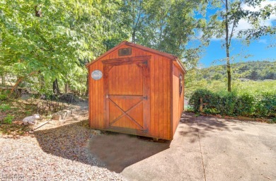 This beautifully maintained log home offers charm, character on Lake Mohawk Golf Club in Ohio - for sale on GolfHomes.com, golf home, golf lot