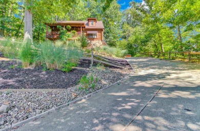 This beautifully maintained log home offers charm, character on Lake Mohawk Golf Club in Ohio - for sale on GolfHomes.com, golf home, golf lot