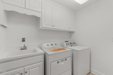 Welcome to this beautiful 2.5 story home on a private, wooded on The Neuse Golf Club in North Carolina - for sale on GolfHomes.com, golf home, golf lot