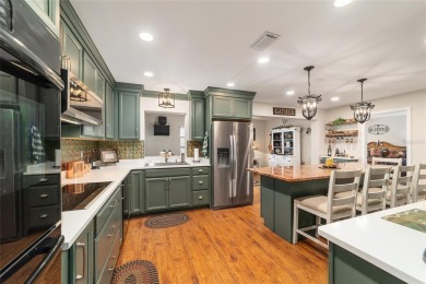 PRICE ADJUSTMENT - Renovated Augusta Villa | End Unit | Park on On Top of the World Golf Course in Florida - for sale on GolfHomes.com, golf home, golf lot