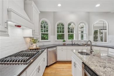 Located in the gated, golf community of Crooked Creek in Milton on Alpharetta Athletic Club East in Georgia - for sale on GolfHomes.com, golf home, golf lot