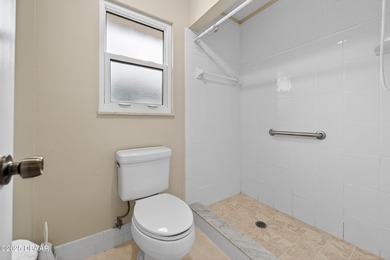 NEW ROOF 12/29/25! FULLY FURNISHED, IMPACT WINDOWS, NEW KITCHEN on The Club At Pelican Bay - North Course in Florida - for sale on GolfHomes.com, golf home, golf lot