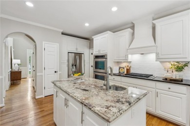 Located in the gated, golf community of Crooked Creek in Milton on Alpharetta Athletic Club East in Georgia - for sale on GolfHomes.com, golf home, golf lot