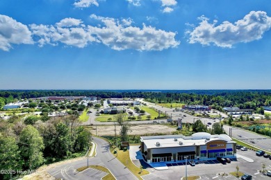 Unlock the full potential of your business in the vibrant on Rivers Edge Golf Club in North Carolina - for sale on GolfHomes.com, golf home, golf lot