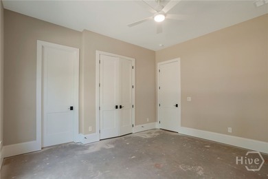 This beautifully designed 5-bedroom home with two bedrooms on on The Georgia Club in Georgia - for sale on GolfHomes.com, golf home, golf lot