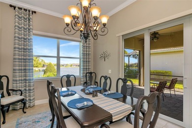 Experience stunning water views from this beautifully updated on Esplanade Golf and Country at Lakewood Ranch in Florida - for sale on GolfHomes.com, golf home, golf lot