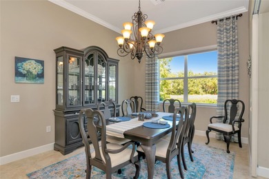 Experience stunning water views from this beautifully updated on Esplanade Golf and Country at Lakewood Ranch in Florida - for sale on GolfHomes.com, golf home, golf lot