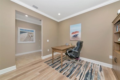 Experience stunning water views from this beautifully updated on Esplanade Golf and Country at Lakewood Ranch in Florida - for sale on GolfHomes.com, golf home, golf lot