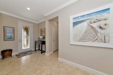 Experience stunning water views from this beautifully updated on Esplanade Golf and Country at Lakewood Ranch in Florida - for sale on GolfHomes.com, golf home, golf lot