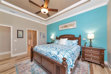 Experience stunning water views from this beautifully updated on Esplanade Golf and Country at Lakewood Ranch in Florida - for sale on GolfHomes.com, golf home, golf lot