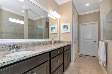 Experience stunning water views from this beautifully updated on Esplanade Golf and Country at Lakewood Ranch in Florida - for sale on GolfHomes.com, golf home, golf lot