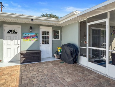 **NEW PRICE** High and Dry, 3-bedroom 2-bathroom concrete block on The Dunedin Country Club in Florida - for sale on GolfHomes.com, golf home, golf lot