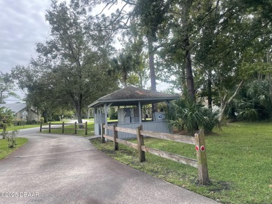 NEW ROOF 12/29/25! FULLY FURNISHED, IMPACT WINDOWS, NEW KITCHEN on The Club At Pelican Bay - North Course in Florida - for sale on GolfHomes.com, golf home, golf lot