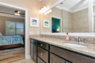 Experience stunning water views from this beautifully updated on Esplanade Golf and Country at Lakewood Ranch in Florida - for sale on GolfHomes.com, golf home, golf lot