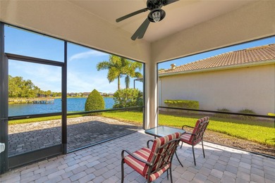 Experience stunning water views from this beautifully updated on Esplanade Golf and Country at Lakewood Ranch in Florida - for sale on GolfHomes.com, golf home, golf lot