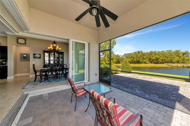 Experience stunning water views from this beautifully updated on Esplanade Golf and Country at Lakewood Ranch in Florida - for sale on GolfHomes.com, golf home, golf lot