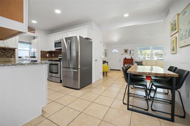 **NEW PRICE** High and Dry, 3-bedroom 2-bathroom concrete block on The Dunedin Country Club in Florida - for sale on GolfHomes.com, golf home, golf lot