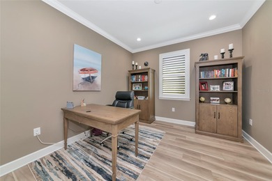 Experience stunning water views from this beautifully updated on Esplanade Golf and Country at Lakewood Ranch in Florida - for sale on GolfHomes.com, golf home, golf lot