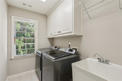 Located in the gated, golf community of Crooked Creek in Milton on Alpharetta Athletic Club East in Georgia - for sale on GolfHomes.com, golf home, golf lot