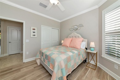 Experience stunning water views from this beautifully updated on Esplanade Golf and Country at Lakewood Ranch in Florida - for sale on GolfHomes.com, golf home, golf lot