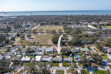 **NEW PRICE** High and Dry, 3-bedroom 2-bathroom concrete block on The Dunedin Country Club in Florida - for sale on GolfHomes.com, golf home, golf lot