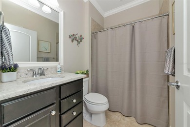 Experience stunning water views from this beautifully updated on Esplanade Golf and Country at Lakewood Ranch in Florida - for sale on GolfHomes.com, golf home, golf lot