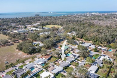 **NEW PRICE** High and Dry, 3-bedroom 2-bathroom concrete block on The Dunedin Country Club in Florida - for sale on GolfHomes.com, golf home, golf lot