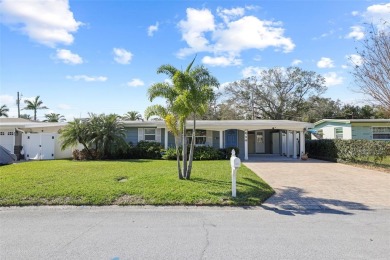 **NEW PRICE** High and Dry, 3-bedroom 2-bathroom concrete block on The Dunedin Country Club in Florida - for sale on GolfHomes.com, golf home, golf lot