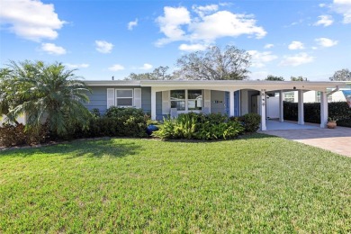 **NEW PRICE** High and Dry, 3-bedroom 2-bathroom concrete block on The Dunedin Country Club in Florida - for sale on GolfHomes.com, golf home, golf lot