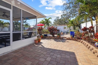 **NEW PRICE** High and Dry, 3-bedroom 2-bathroom concrete block on The Dunedin Country Club in Florida - for sale on GolfHomes.com, golf home, golf lot