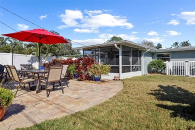 **NEW PRICE** High and Dry, 3-bedroom 2-bathroom concrete block on The Dunedin Country Club in Florida - for sale on GolfHomes.com, golf home, golf lot