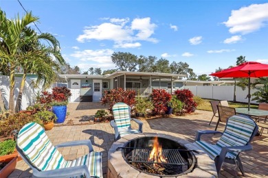 **NEW PRICE** High and Dry, 3-bedroom 2-bathroom concrete block on The Dunedin Country Club in Florida - for sale on GolfHomes.com, golf home, golf lot