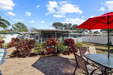 **NEW PRICE** High and Dry, 3-bedroom 2-bathroom concrete block on The Dunedin Country Club in Florida - for sale on GolfHomes.com, golf home, golf lot