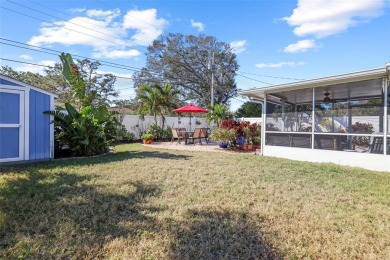 **NEW PRICE** High and Dry, 3-bedroom 2-bathroom concrete block on The Dunedin Country Club in Florida - for sale on GolfHomes.com, golf home, golf lot