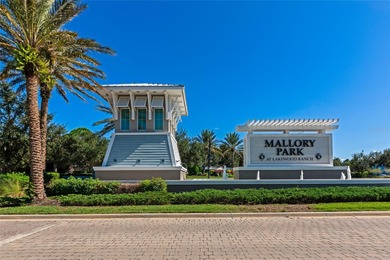 Experience stunning water views from this beautifully updated on Esplanade Golf and Country at Lakewood Ranch in Florida - for sale on GolfHomes.com, golf home, golf lot