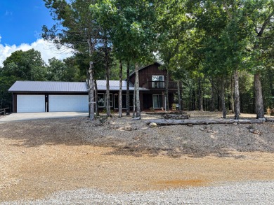 This 3 bedroom, 3 bath home sits on 6 lots in Country Club Hills on Lost Woods Golf Course in Missouri - for sale on GolfHomes.com, golf home, golf lot