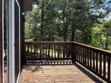 This 3 bedroom, 3 bath home sits on 6 lots in Country Club Hills on Lost Woods Golf Course in Missouri - for sale on GolfHomes.com, golf home, golf lot