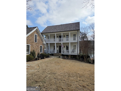 Perfectly poised along the serene shores of northern Lake Lanier on Chestatee Golf Club in Georgia - for sale on GolfHomes.com, golf home, golf lot