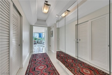 From the moment you step inside this stunning Turnberry Towers on Las Vegas Country Club in Nevada - for sale on GolfHomes.com, golf home, golf lot