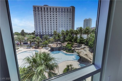 From the moment you step inside this stunning Turnberry Towers on Las Vegas Country Club in Nevada - for sale on GolfHomes.com, golf home, golf lot