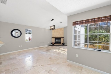 Welcome to 1675 Polo Club Dr, a home that makes it easy to slow on Tarpon Springs Golf Course in Florida - for sale on GolfHomes.com, golf home, golf lot