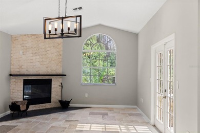 Welcome to 1675 Polo Club Dr, a home that makes it easy to slow on Tarpon Springs Golf Course in Florida - for sale on GolfHomes.com, golf home, golf lot